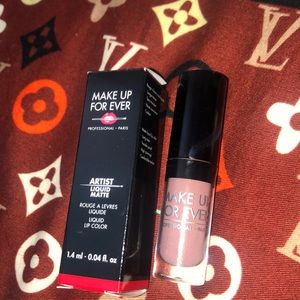 Selling this mauve colored liquid lipstick mini